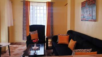 Classic Apartment | Living area | 14-inch Smart TV with digital channels, TV