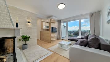 Suite Deluks, 1 kamar tidur, perapian, pemandangan kebun | 2 kamar tidur, seprai katun Mesir, dan seprai premium