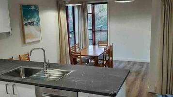 Coffee/tea maker, fridge, microwave, oven