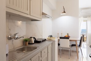 Apartment, 2 Bedrooms, Balcony, Sea View | Private kitchen | Fridge, stovetop, electric kettle, toaster - Salt and Sun Apartments by Konnect, Kaminaki Beach (Corfu)