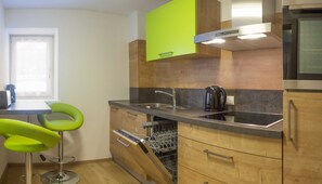 Fridge, oven, dishwasher, high chair