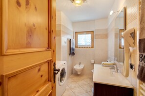 Shower, hair dryer, towels