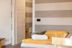 2 quartos, Wi-Fi de cortesia, roupa de cama