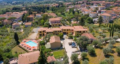 Apartment 'Bilocale Correggiolo' with Terrace, Shared Pool & Wi-Fi