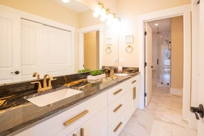 Bathtub, hair dryer, towels