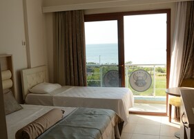 Chambre Triple Standard, 1 chambre, fumeurs, vue plage | Wi-Fi gratuit