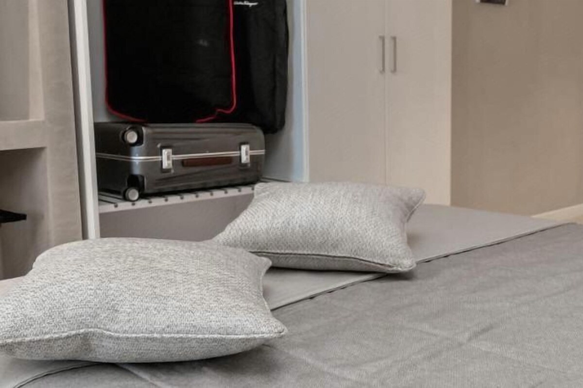 Luxe beddengoed, een minibar, een kluis op de kamer, een bureau