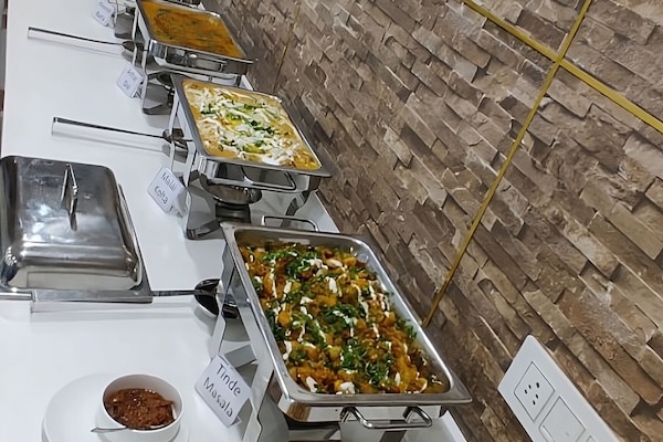 Daily buffet breakfast (INR 400 per person)