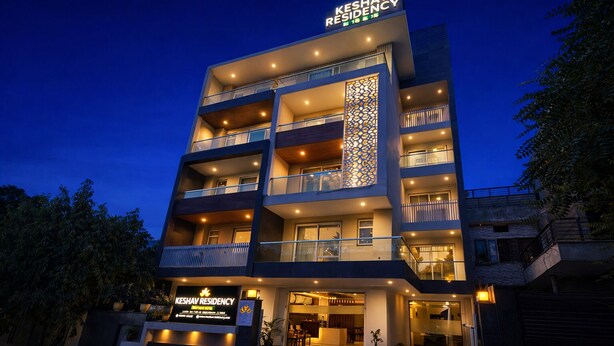A multi-story hotel with balconies, a reception area, and a sign reading "Keshav Residency". - Hotel Keshav Residency - Medicity Gurugram, near Medanta Hospital (Gurugram)