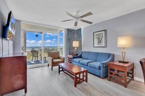 Signature Condo, 2 Bedrooms, Ocean View, Beachfront | Living room | 50-inch Smart TV with cable channels, TV, table tennis - Dunes Village Resort by Hosteeva (Myrtle Beach)