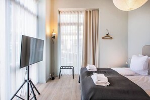 1 slaapkamer, een strijkplank/strijkijzer, reisbedje, wifi