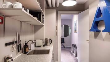 Fridge, microwave, coffee/tea maker, toaster