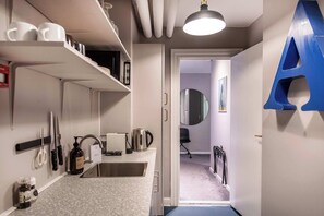 Fridge, microwave, coffee/tea maker, toaster