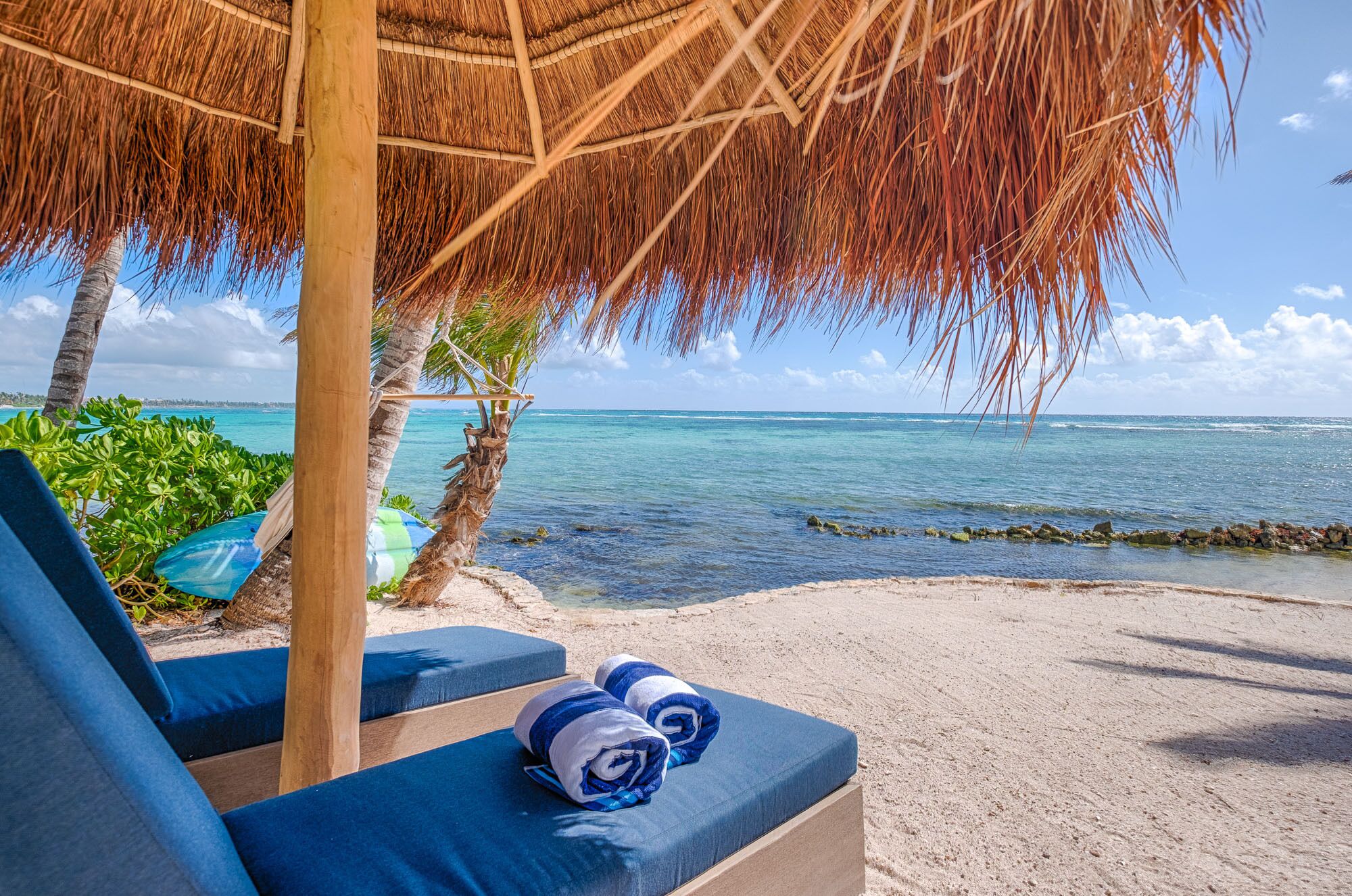 On the beach, sun loungers, beach towels