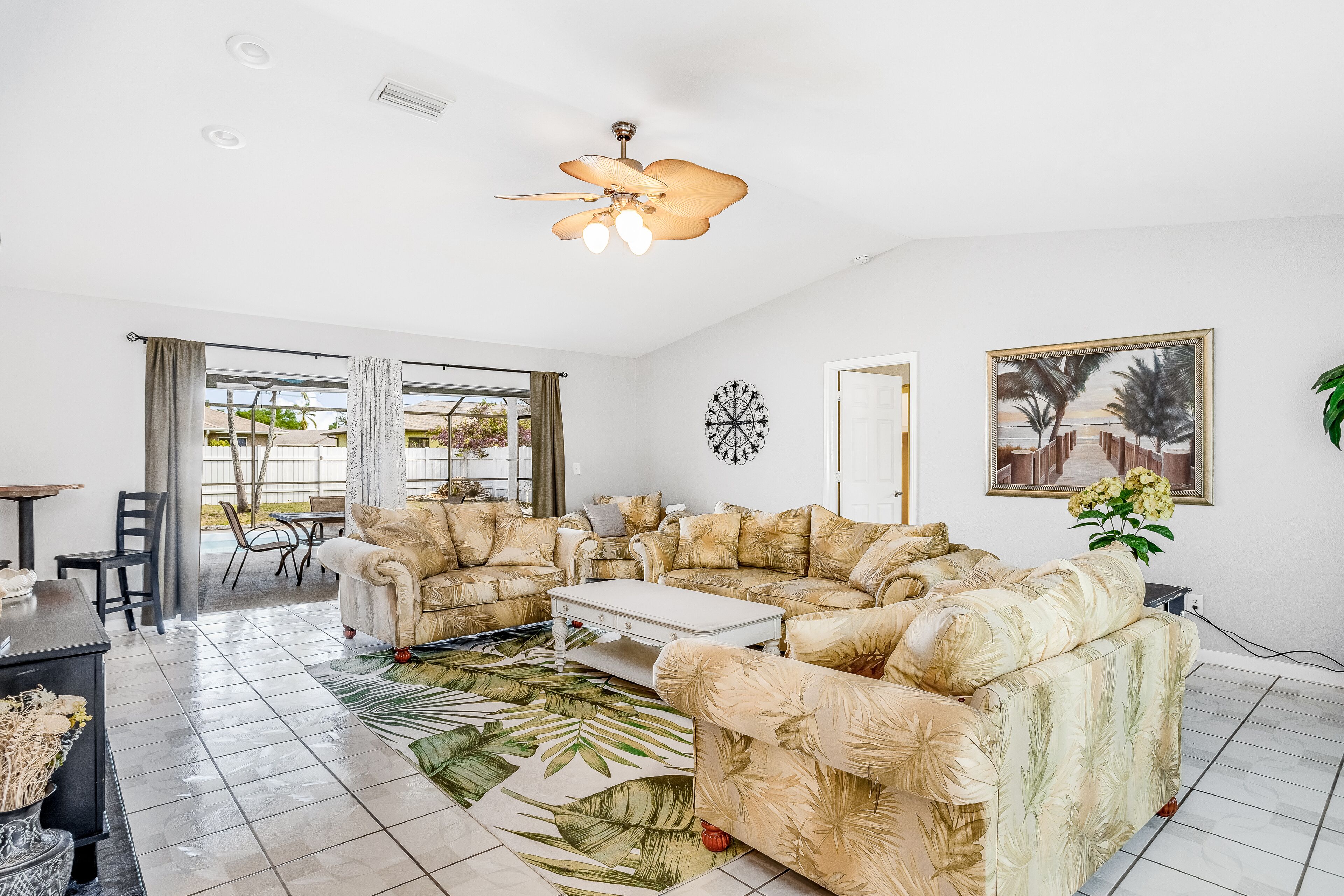 Snowbird-friendly home with enclosed yard, pool, patio, AC, & WiFi - 2 dogs OK