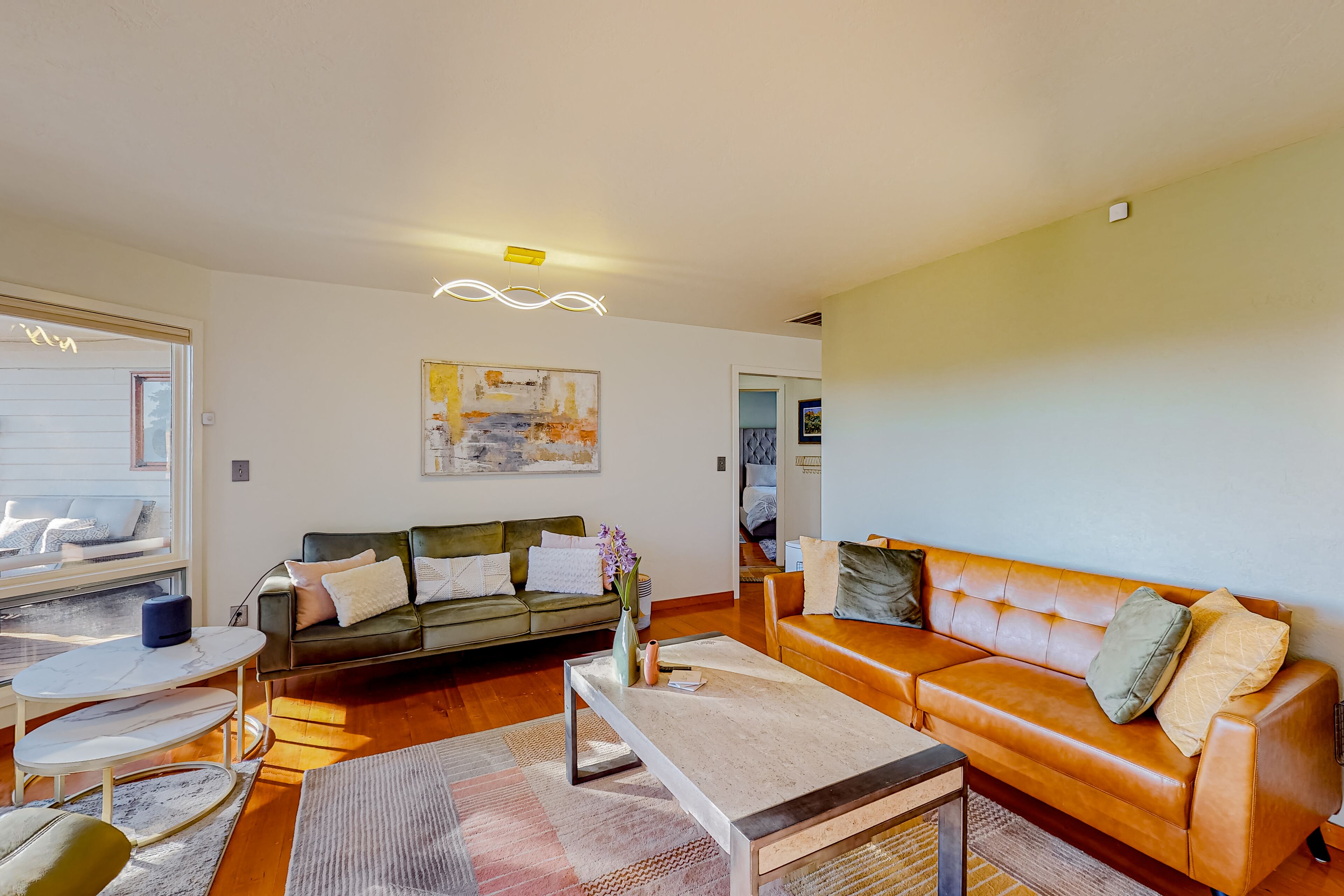 Dog-friendly home with great deck, firepit & fireplace - walk to shops & dining