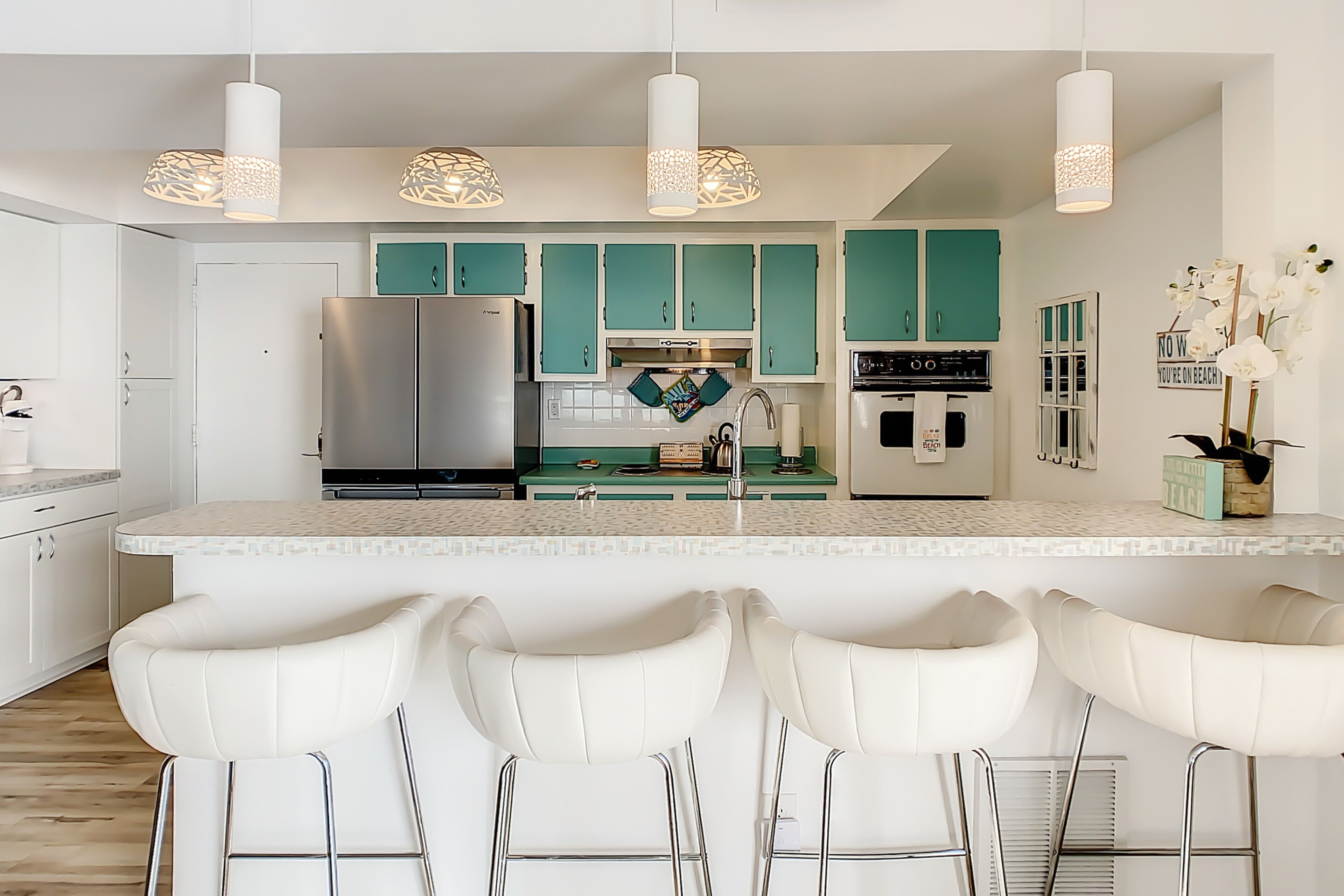 Top-floor, oceanfront condo with balcony