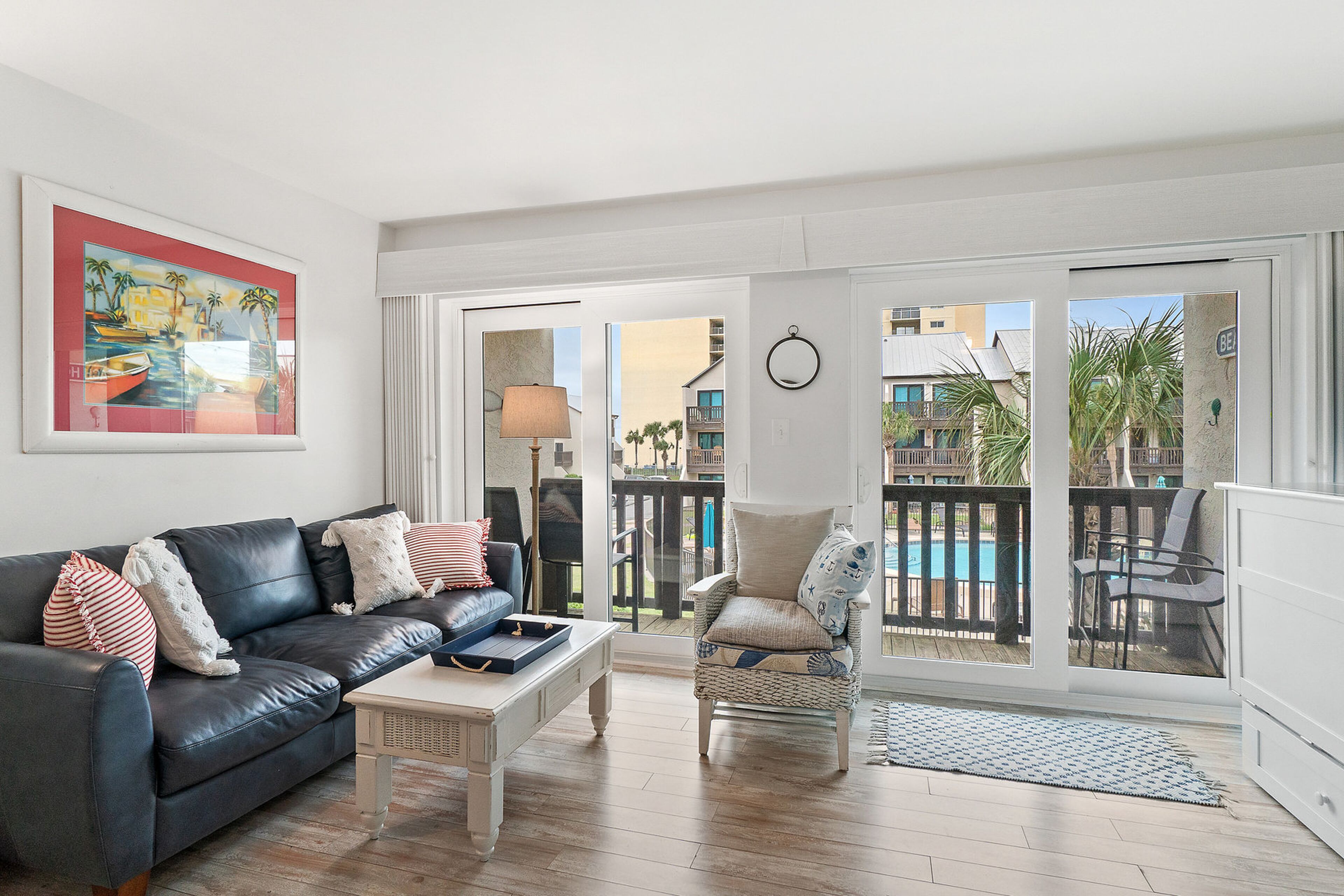 Beach bungalow with 2 separate balconies, shared pool & hot tub, WiFi, AC