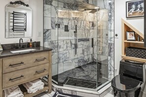 Combined shower/tub, hair dryer, towels, toilet paper