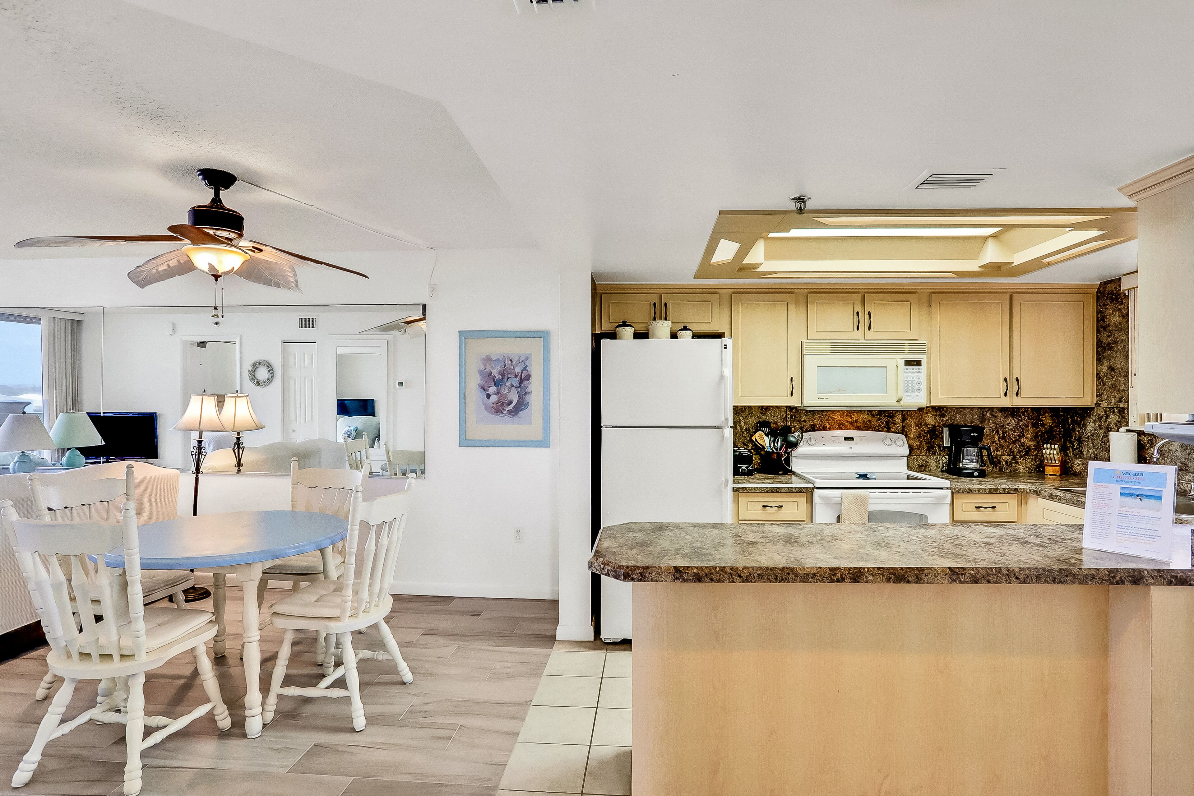 Condo in an oceanfront building with side ocean view, balcony, AC, WiFi & pool