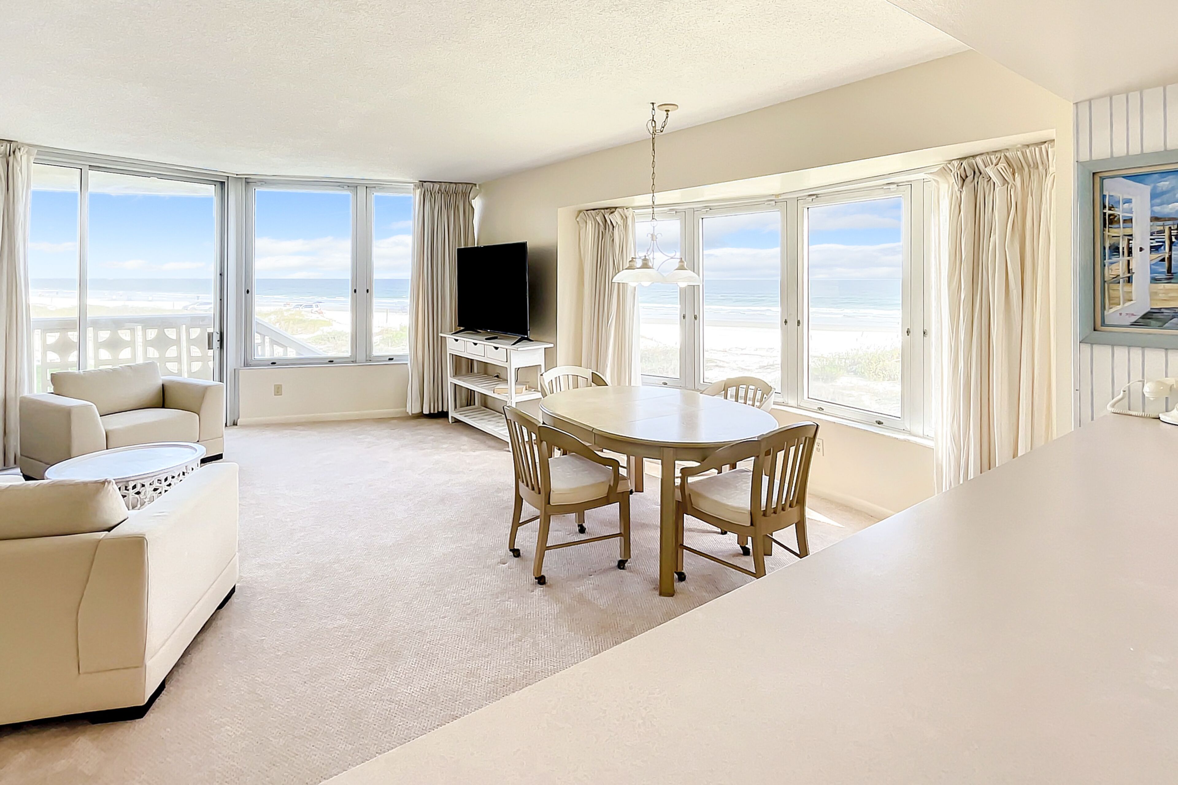Oceanfront condo with balcony, pool, & central AC - snowbird-friendly