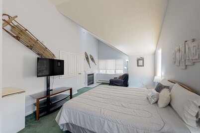 Riverfront condo with mountain view, pool, & hot tub - two miles from the slopes