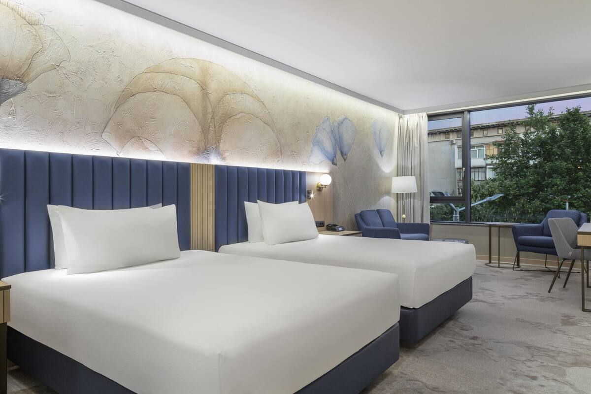 Premium bedding, memory foam beds, minibar, in-room safe