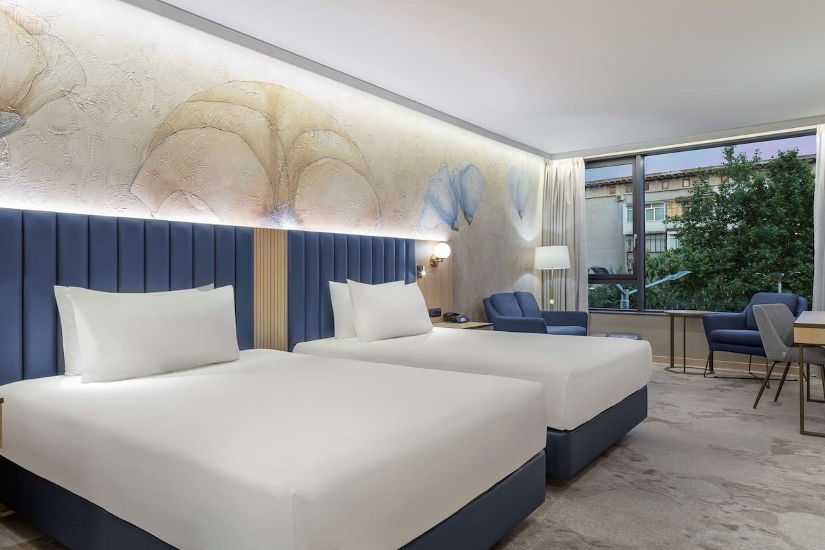 deluxe room, 2 queen beds | premium bedding, memory-foam beds, minibar, in-room safe