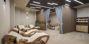 A spa room with wooden lounge chairs, a sofa, and a wooden cabinet with towels. - Doubletree By Hilton Plovdiv Center (Plovdiv)