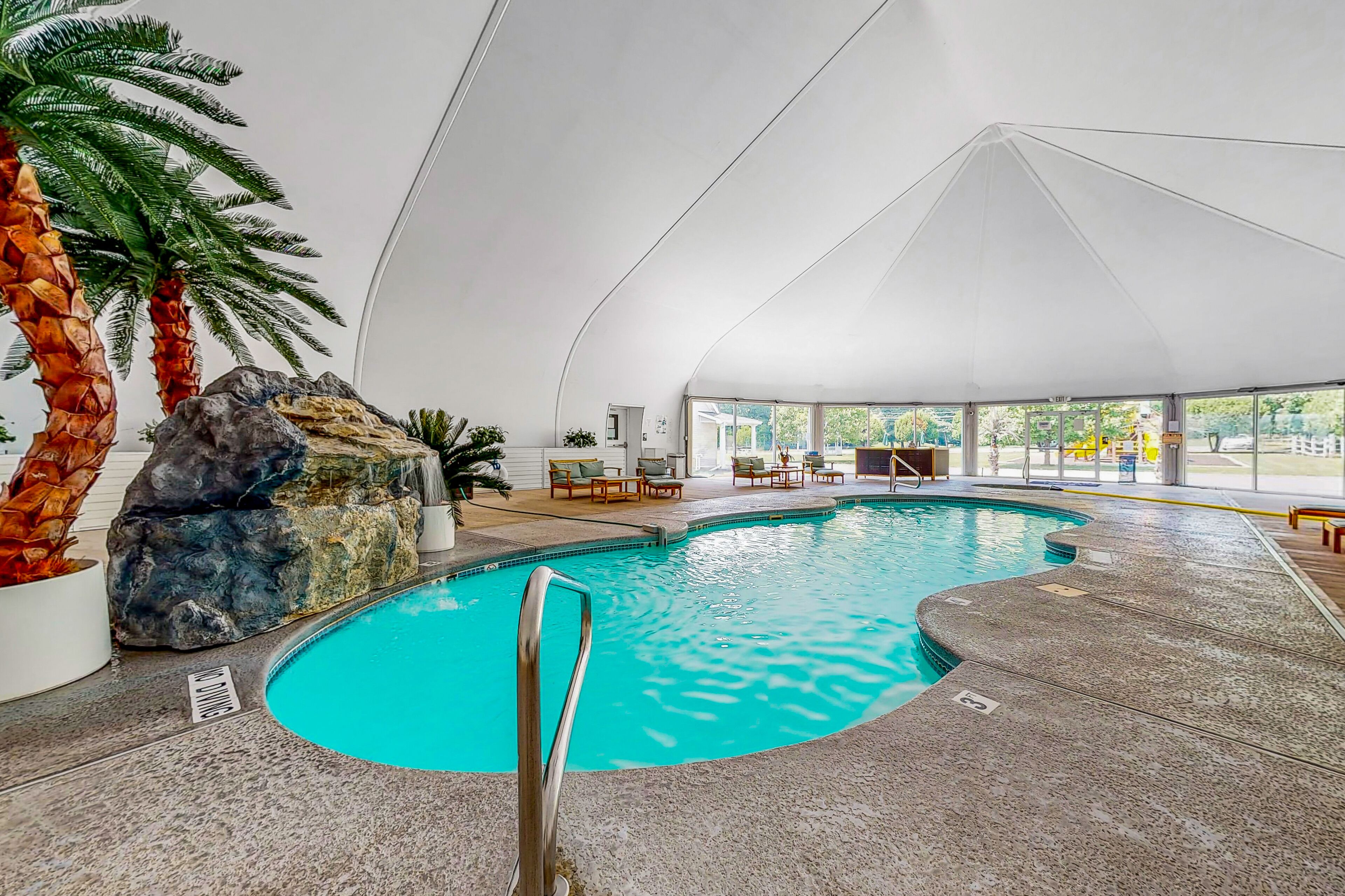 Dog-friendly house with wood-burning fireplace, upscale kitchen, and shared pool