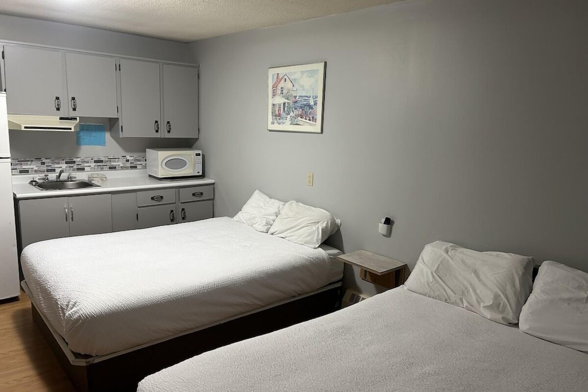 Desk, laptop workspace, free WiFi, bed sheets