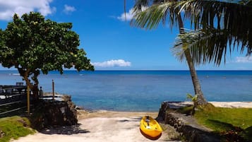 On the beach, sun-loungers, beach towels
