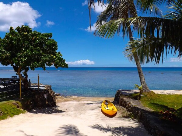 On the beach, sun-loungers, beach towels