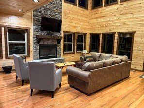 Smart TV, fireplace, foosball