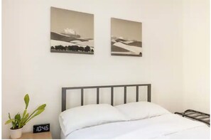 3 bedrooms, desk, iron/ironing board, travel cot