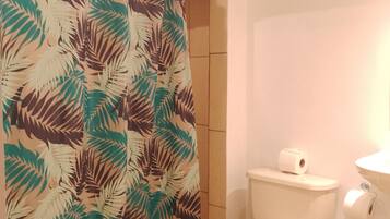 Comfort Apartment | Bathroom | Shower, rainfall showerhead, soap, shampoo