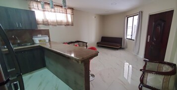 Business Apartment, 2 Bedrooms | Private kitchen | Full-size fridge, microwave, toaster, rice cooker