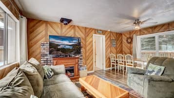House, Multiple Beds, Patio, Mountain View (Whispering Pines Cabin) | Living area | 50-inch flat-screen TV with digital channels, fireplace