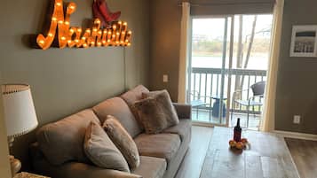 Condo, 1 King Bed with Sofa bed, Balcony | Living room | TV
