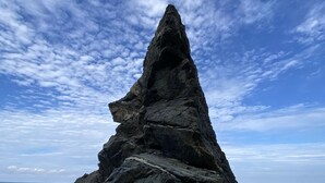 A rock formation on a beach with the ocean in the background. - Exclusive Beach Front Luxe Boutique Retreat (Bahia de Banderas)