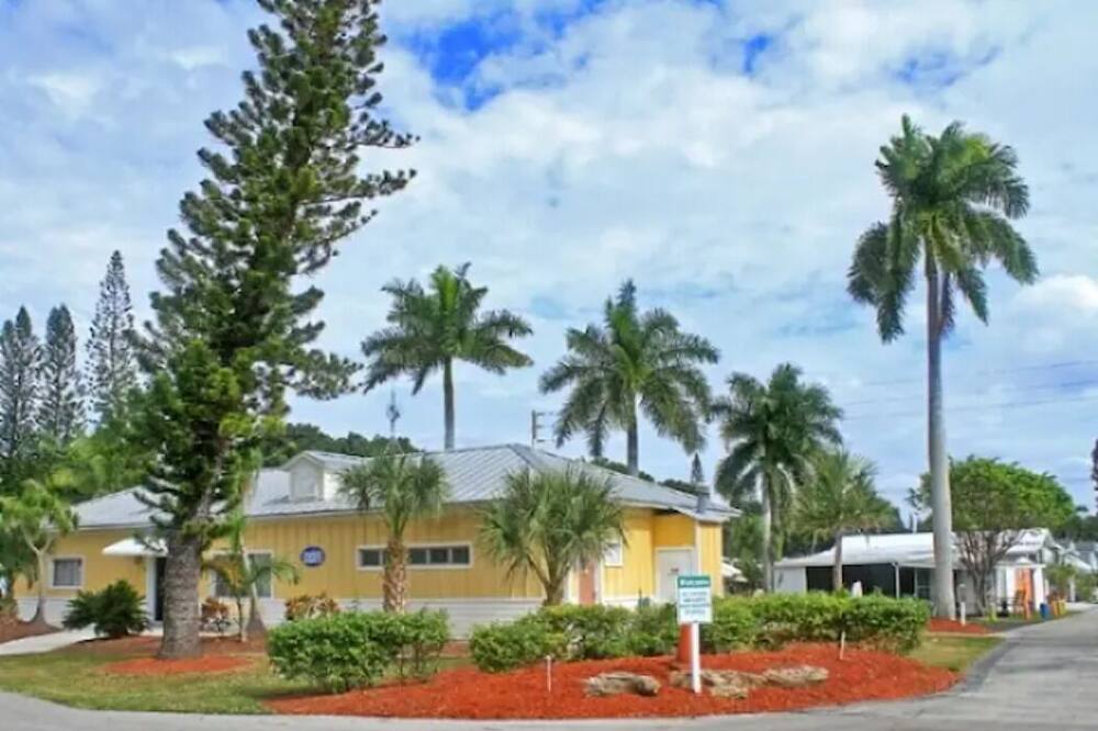 In a resort very close to the beach with heated  pool hot tub