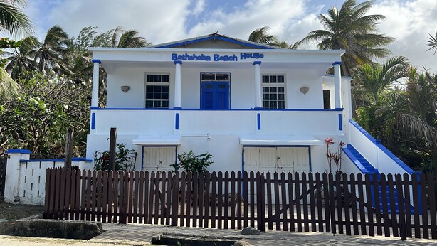 A two-story building with a sign reading "Bathsheba Beach House." - Surfs Up - bungalow style Beachhouse opposite Atlantic Ocean (Bathsheba)