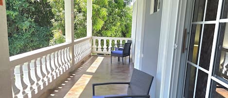 Quarto superluxo, 1 cama King, vista para o jardim | Terraço/pátio