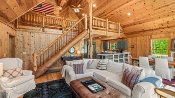 Smart TV, fireplace, books, stereo