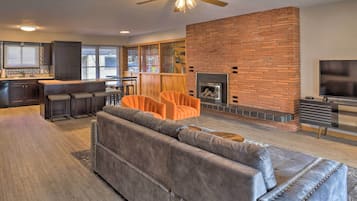 TV, fireplace, books