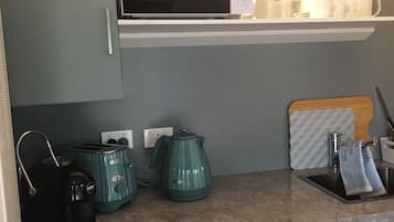 Fridge, microwave, coffee/tea maker, electric kettle