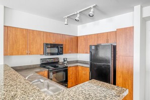 Fridge, microwave, oven, dishwasher - Bright Downtown Bellevue 2BR w/ W/D & Storage, near Shops, by Blueground (Seattle)