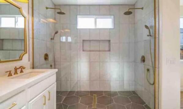 Bathtub, hair dryer, towels, soap