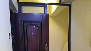 Deluxe Apartment | Living area | 14-inch Smart TV with digital channels, TV - Stay.Plus Hurlingham Business Apartment (Nairobi)