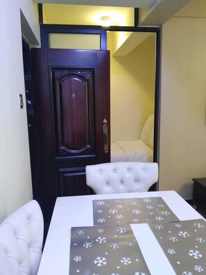 Deluxe Apartment | Living area | 14-inch Smart TV with digital channels, TV - Stay.Plus Hurlingham Business Apartment (Nairobi)